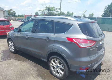 2014 Ford Escape Titanium z USA, uszkodzony, nr VIN 1FMCU0J9XEUC10891